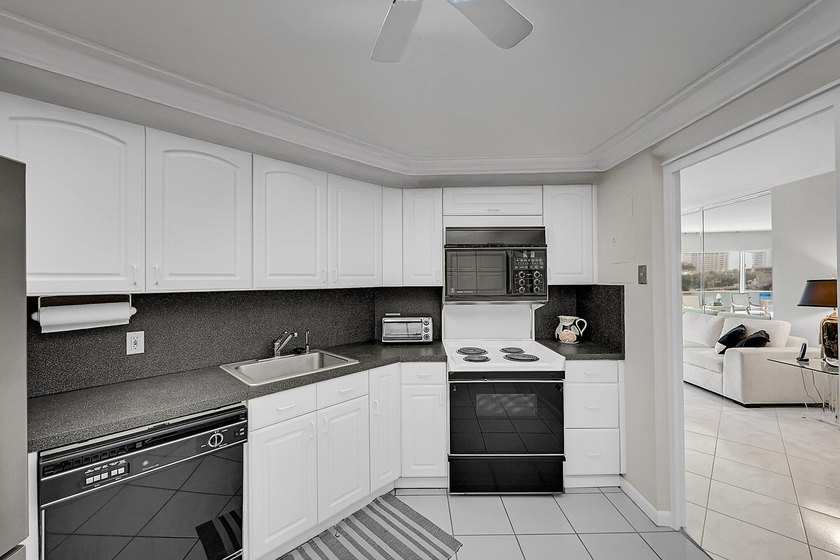 Experience the ultimate coastal lifestyle in this rarely - photo 17