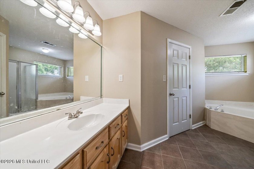 This beautifully designed home offers 4 bedrooms and 2 full - photo 14