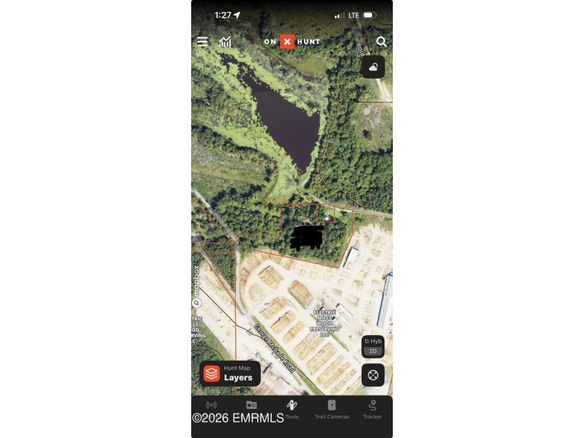 The perfect lot to build a camp or home on overlooking a lake - photo 2