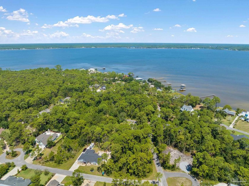 This charming .32-acre parcel within the gated community of - photo 33