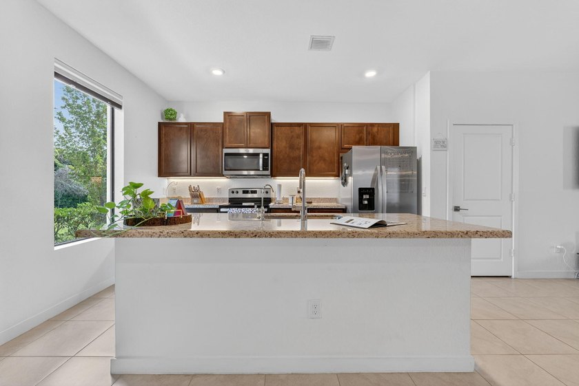 Welcome to this stunning and highly sought-after residence - photo 6