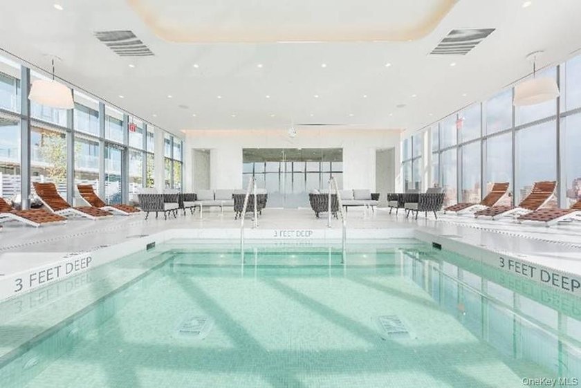 Welcome to this top-floor, south-facing 2-bedroom, 2-bathroom + - photo 3