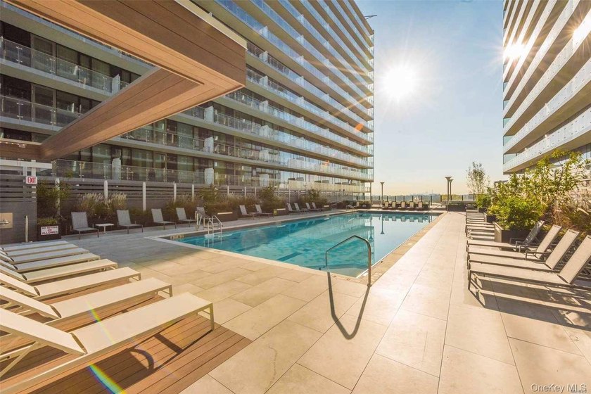 Welcome to this top-floor, south-facing 2-bedroom, 2-bathroom + - photo 4