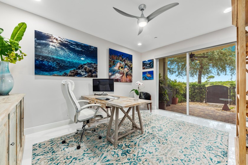 Tucked away in an intimate gated community just one block from - photo 23