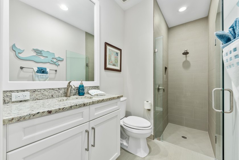 Tucked away in an intimate gated community just one block from - photo 27