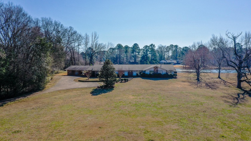 Welcome to this special lakefront property on 5 peaceful acres - photo 2