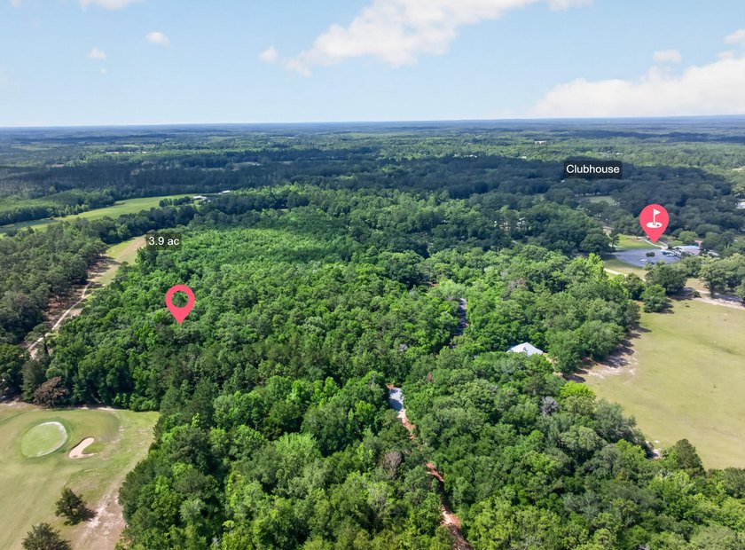 This expansive 3.9-acre parcel in Dogwood Lakes Estates, a - photo 11