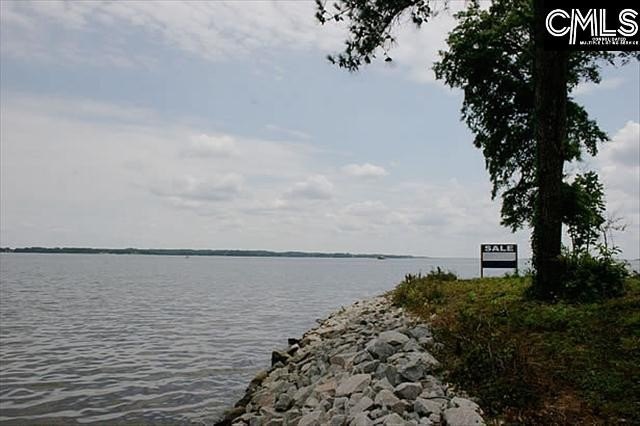 Build your waterfront home on an ultra-private, dream lot in the - photo 6