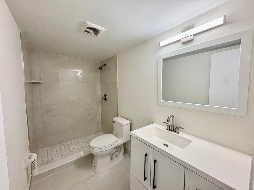 Experience effortless coastal living in this beautifully - photo 5