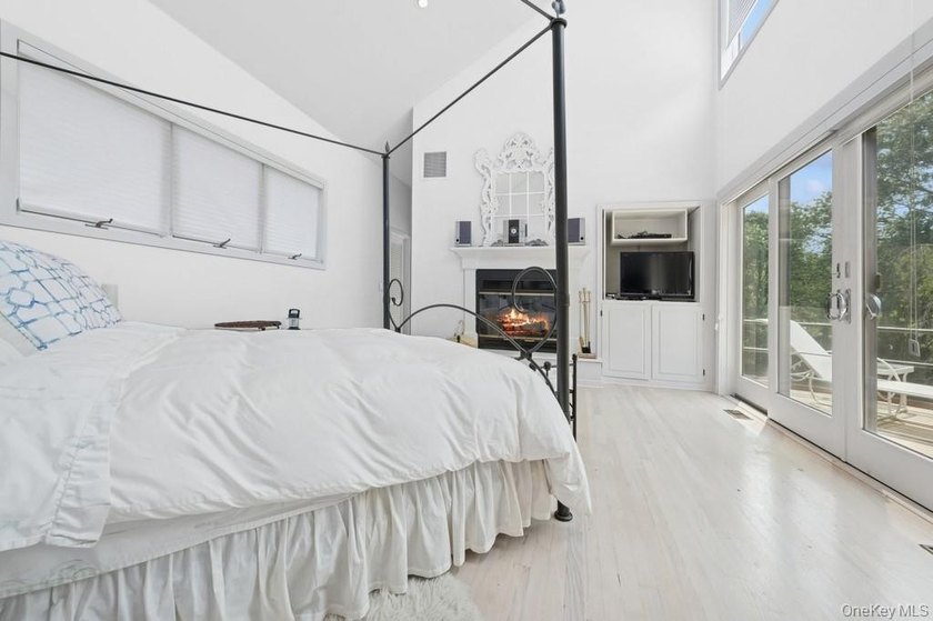 Tucked away on 1.4 acres of lush, landscaped grounds, this - photo 11