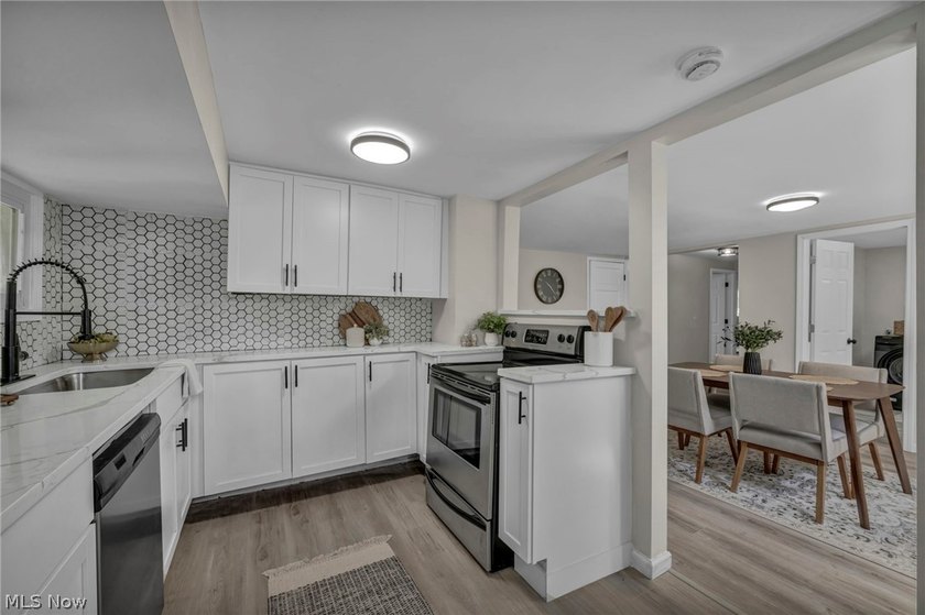 This charming bungalow-style home in the heart of Bay Village - photo 11