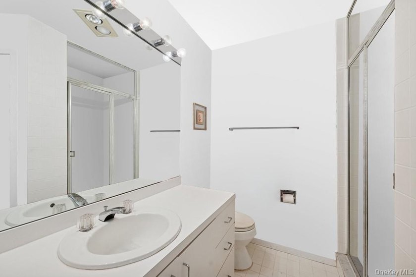 Tucked away on 1.4 acres of lush, landscaped grounds, this - photo 17