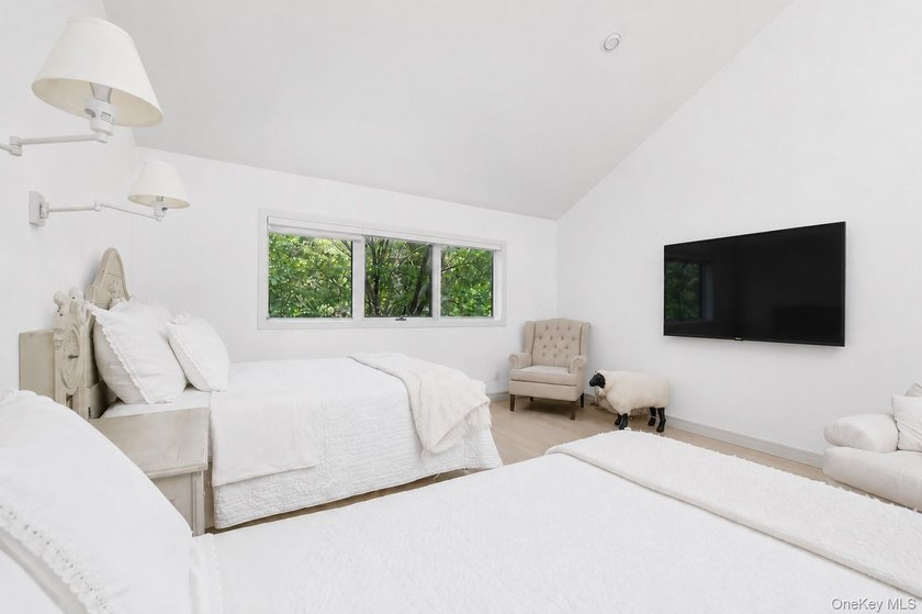Tucked away on 1.4 acres of lush, landscaped grounds, this - photo 18
