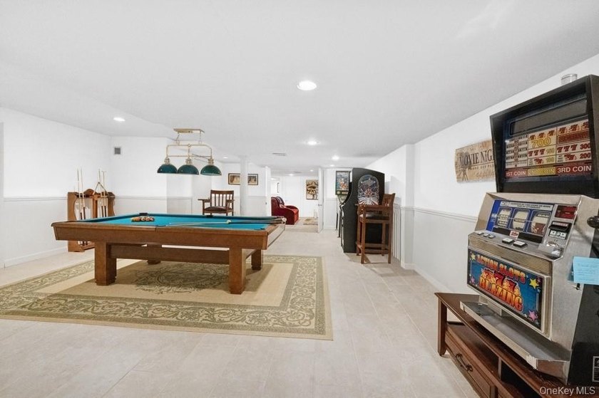Tucked away on 1.4 acres of lush, landscaped grounds, this - photo 19
