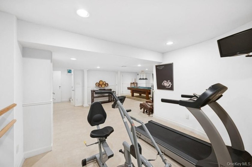 Tucked away on 1.4 acres of lush, landscaped grounds, this - photo 21