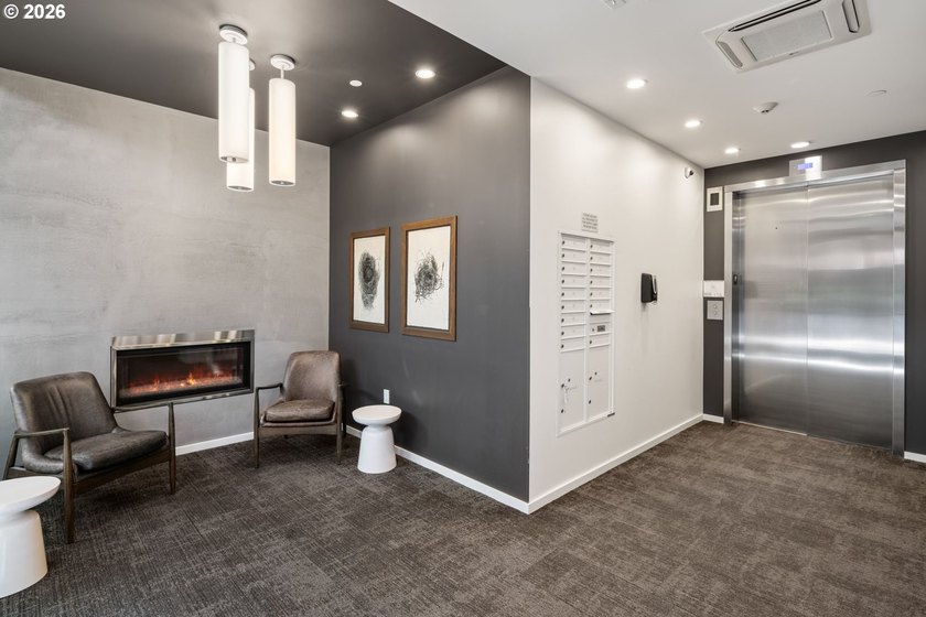 Experience elevated urban living at Carbon12, an award-winning - photo 3