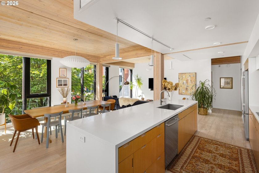 Experience elevated urban living at Carbon12, an award-winning - photo 7