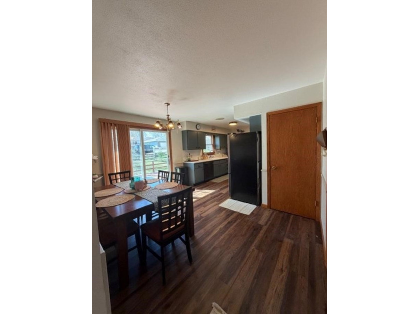 This home features a 2-car attached garage and a thoughtfully - photo 11