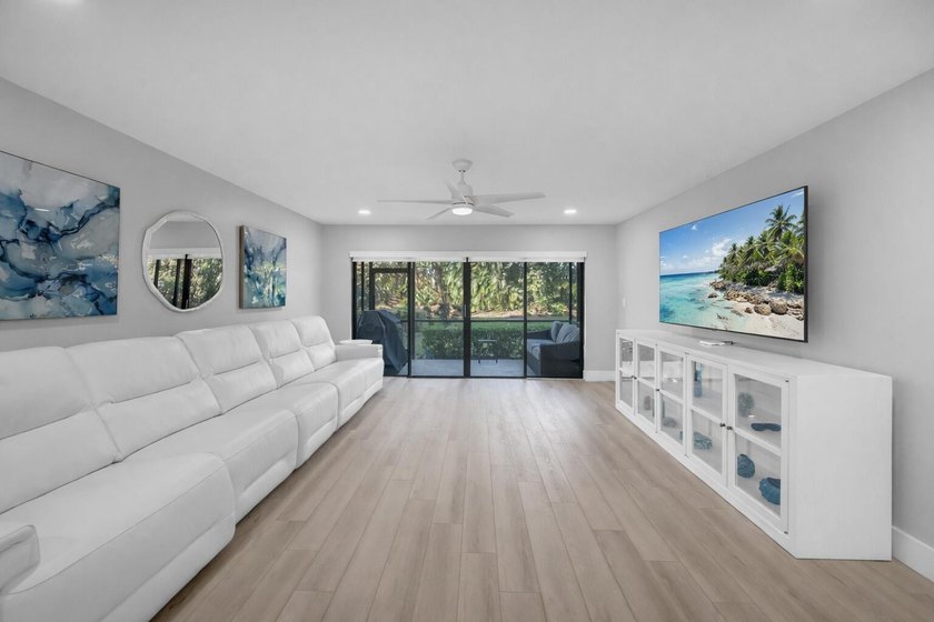 A fully renovated, white-and-bright coastal contemporary retreat - photo 11