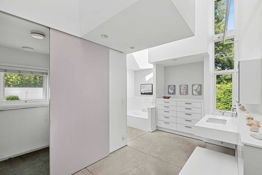 Located on a quiet lane in the heart of Sagaponack Village, this - photo 16