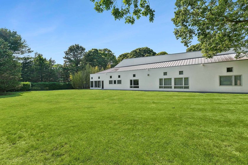 Located on a quiet lane in the heart of Sagaponack Village, this - photo 26