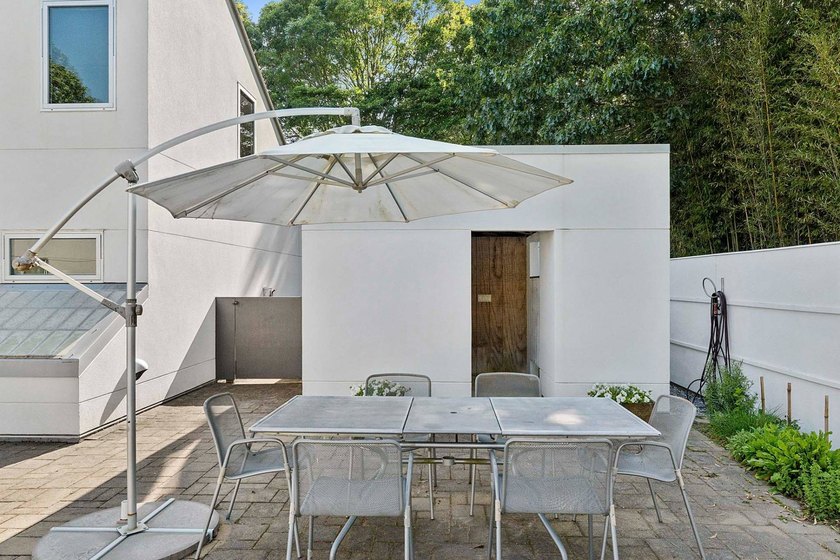 Located on a quiet lane in the heart of Sagaponack Village, this - photo 28