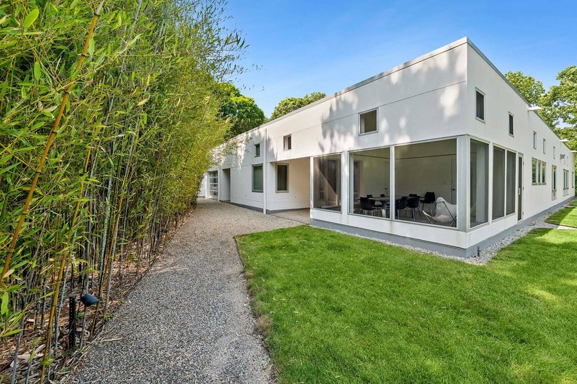 Located on a quiet lane in the heart of Sagaponack Village, this - photo 30