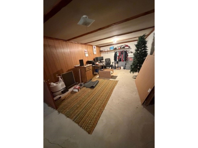 This home features a 2-car attached garage and a thoughtfully - photo 33