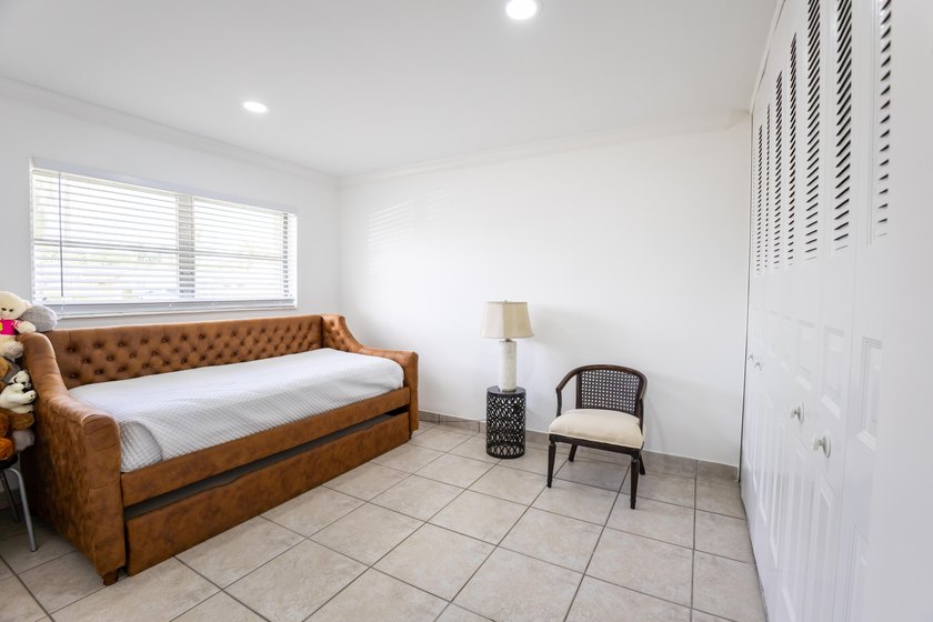 Charming and move-in ready 2-bedroom, 2-bath villa located in - photo 17