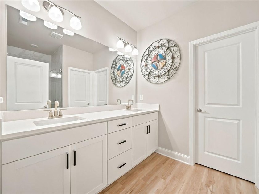 Sophistication meets the relaxed charm of lake living. This - photo 20