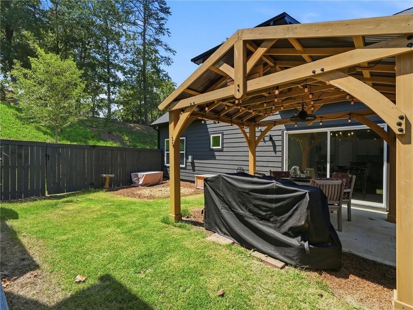 Sophistication meets the relaxed charm of lake living. This - photo 33