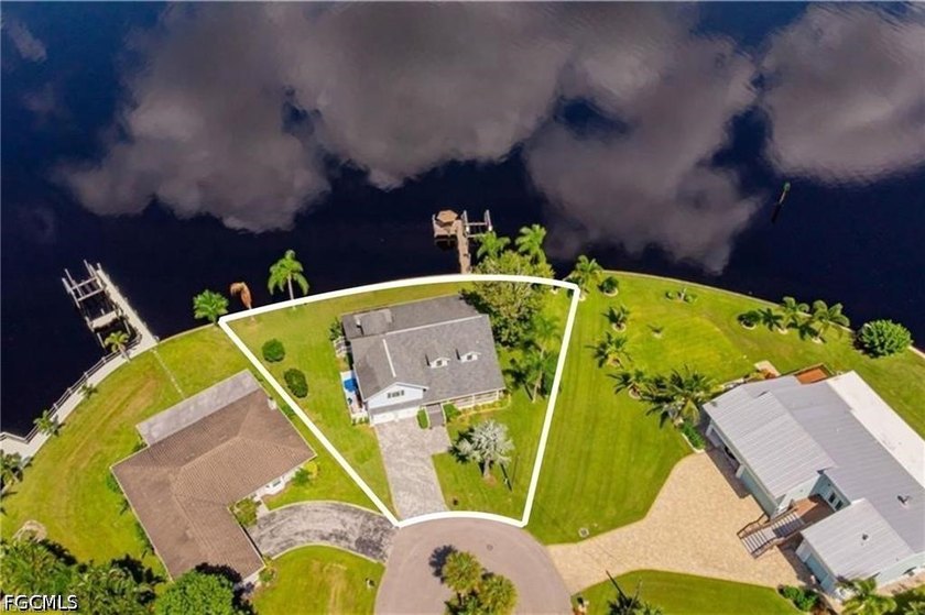 Welcome home to this furnished elevated home only steps from the - photo 2