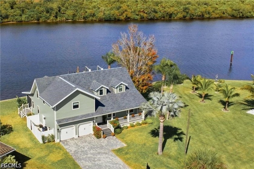 Welcome home to this furnished elevated home only steps from the - photo 4