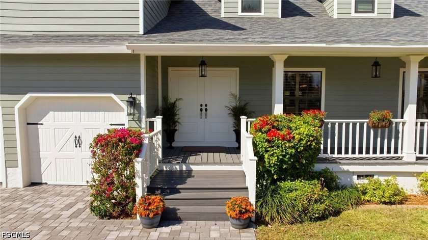 Welcome home to this furnished elevated home only steps from the - photo 8