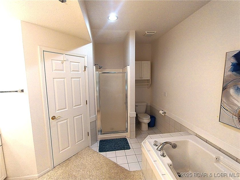 Impeccable 3-bedroom, 3-bath furnished lakefront condo with - photo 16