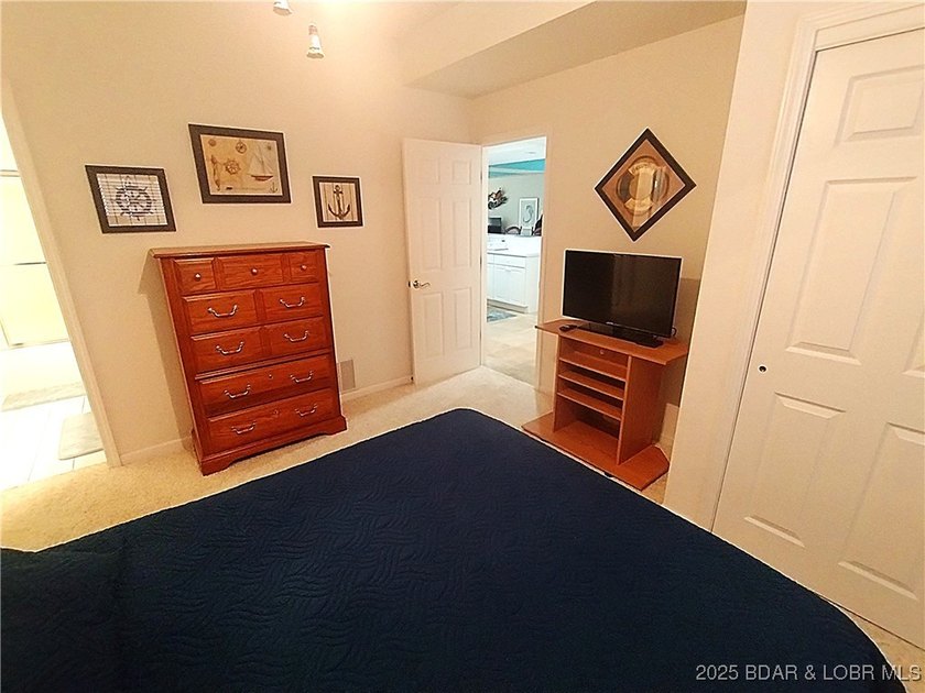 Impeccable 3-bedroom, 3-bath furnished lakefront condo with - photo 19