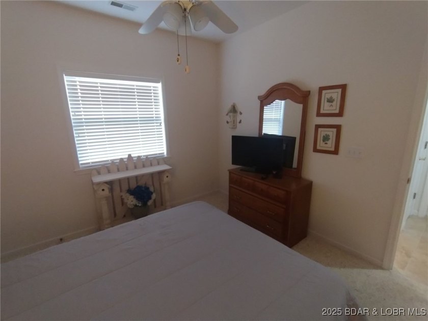 Impeccable 3-bedroom, 3-bath furnished lakefront condo with - photo 23