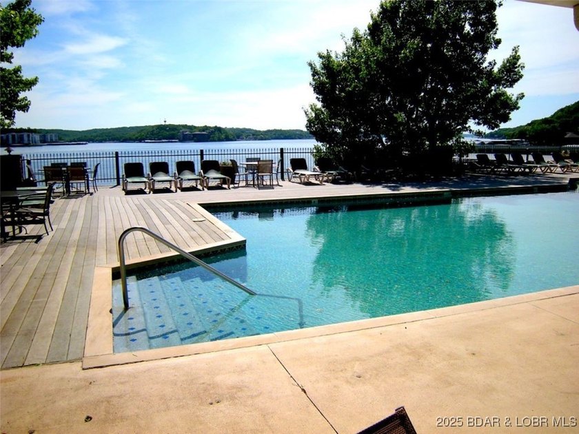 Impeccable 3-bedroom, 3-bath furnished lakefront condo with - photo 33