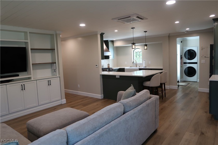 Step inside this recently renovated hidden gem, located directly - photo 3