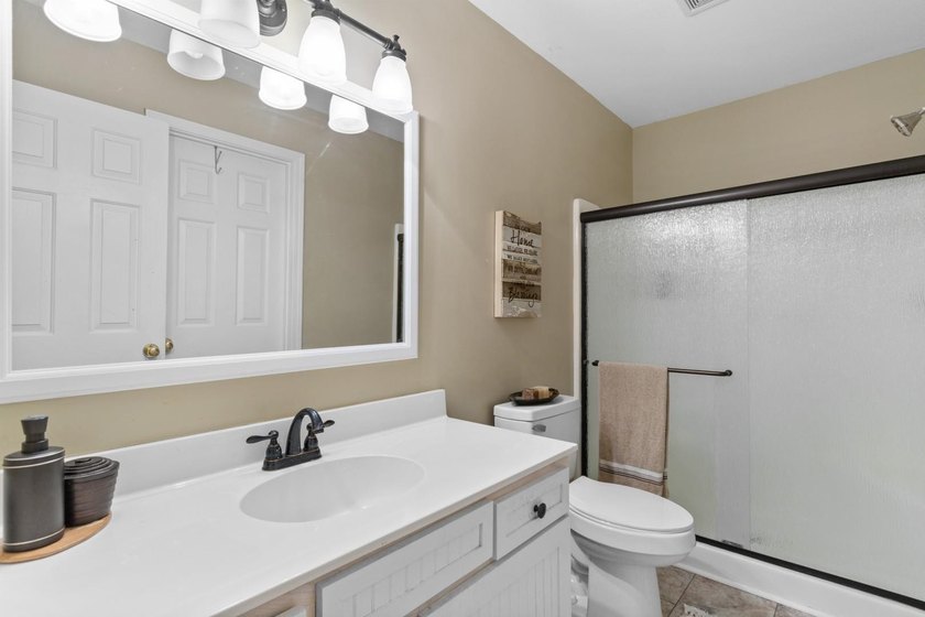 This top-floor 3-bedroom condo has the kind of charm and warmth - photo 16