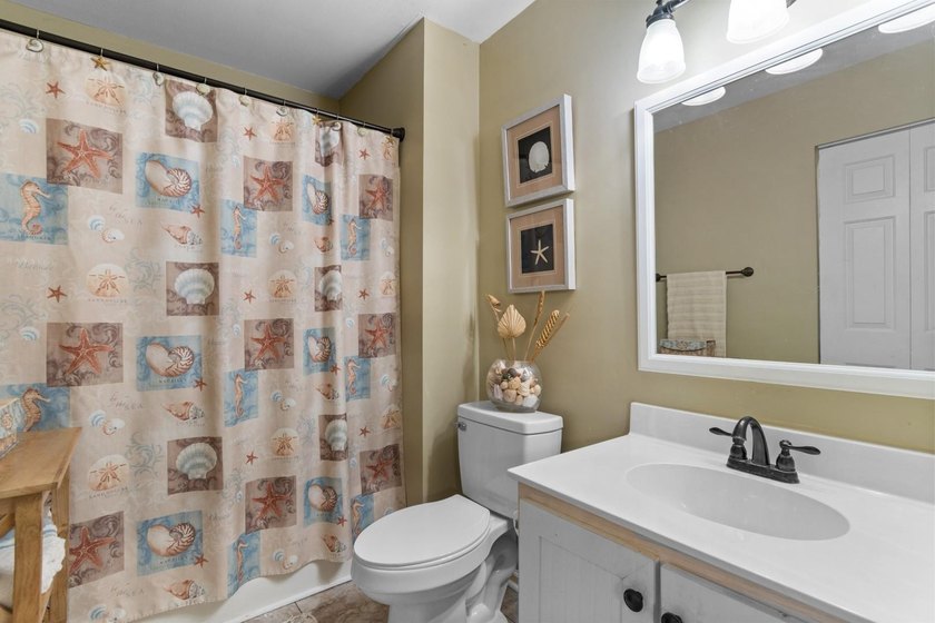 This top-floor 3-bedroom condo has the kind of charm and warmth - photo 20