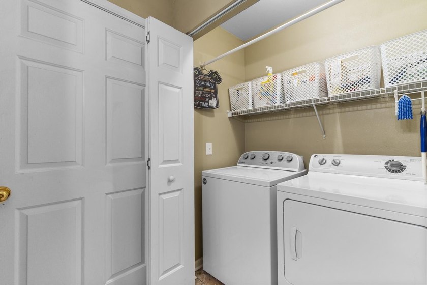 This top-floor 3-bedroom condo has the kind of charm and warmth - photo 24