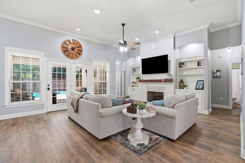Movie theater? Covered heated pool? This stunning 5 bed, 4 bath - photo 13