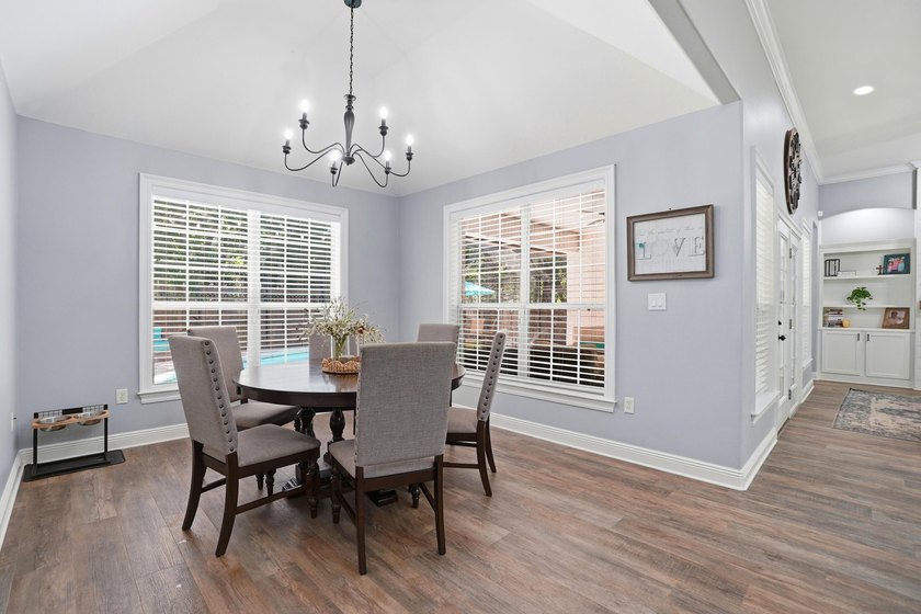 Movie theater? Covered heated pool? This stunning 5 bed, 4 bath - photo 18