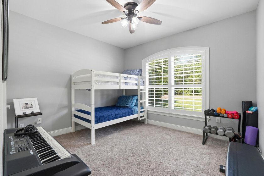 Movie theater? Covered heated pool? This stunning 5 bed, 4 bath - photo 25