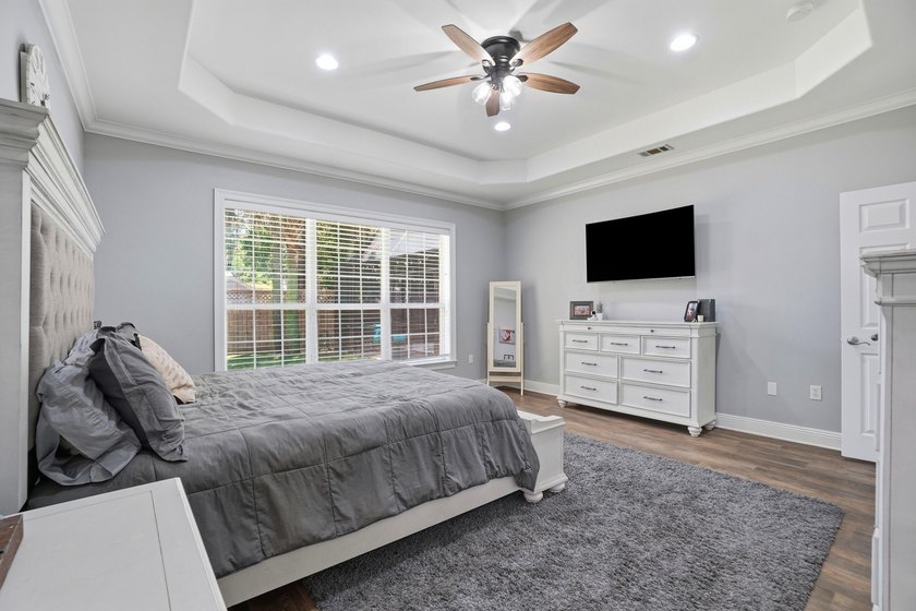 Movie theater? Covered heated pool? This stunning 5 bed, 4 bath - photo 28