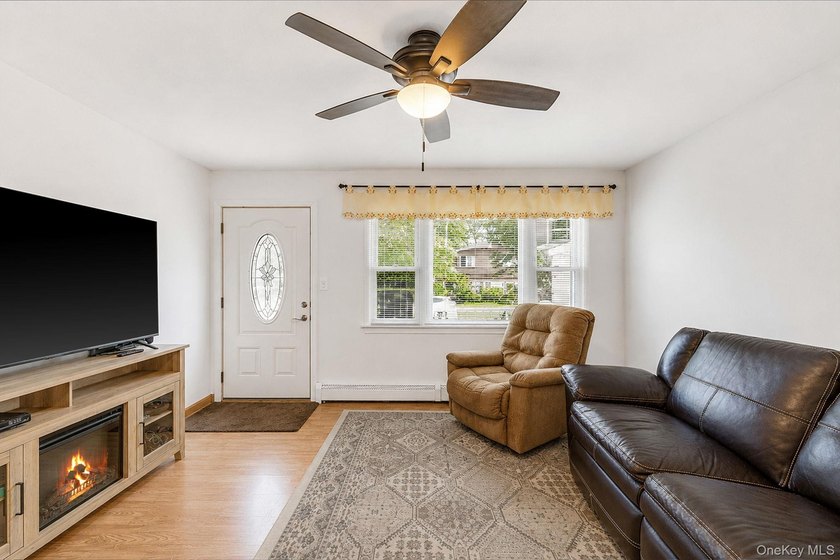 This charming classic 3-bedroom, 2-bath ranch offers comfort - photo 6