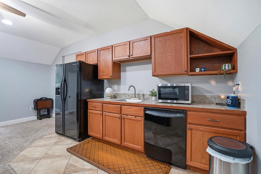 Movie theater? Covered heated pool? This stunning 5 bed, 4 bath - photo 37