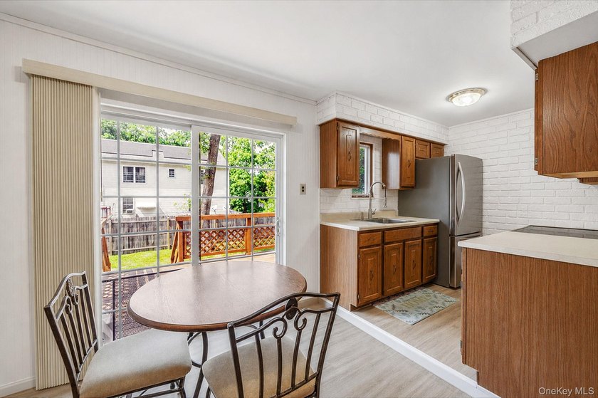 This charming classic 3-bedroom, 2-bath ranch offers comfort - photo 8