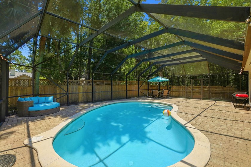Movie theater? Covered heated pool? This stunning 5 bed, 4 bath - photo 47